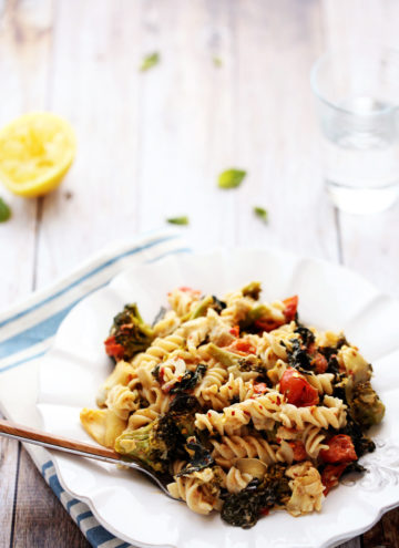 Comforting Kitchen Sink Pasta with Artichokes, Tomatoes, Kale, Broccoli and Vegan Sunflower Seed Alfredo