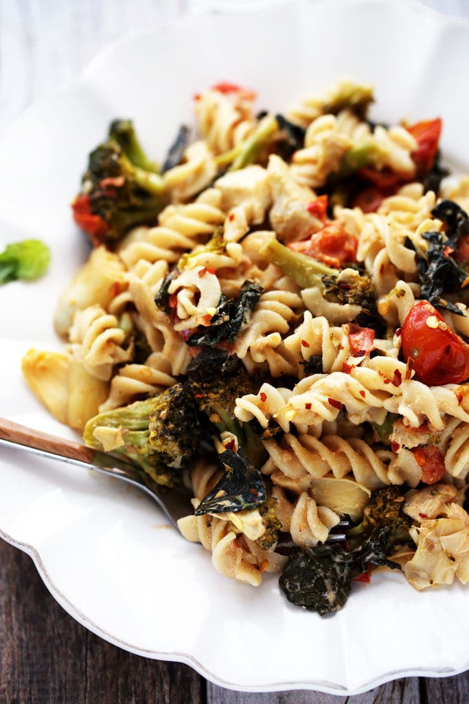 Comforting Kitchen Sink Pasta with Artichokes, Tomatoes, Kale, Broccoli and Vegan Sunflower Seed Alfredo