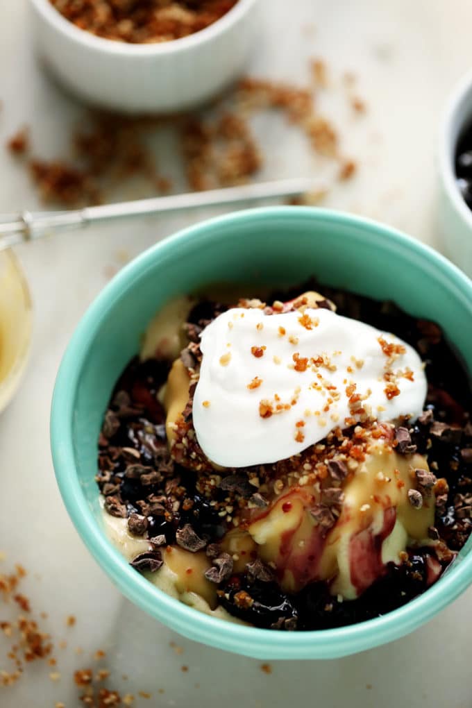 Hot Tahini Sundae with Banana Ice Cream, Cherry Compote & Sunflower Crumble | A decadent vegan sundae!