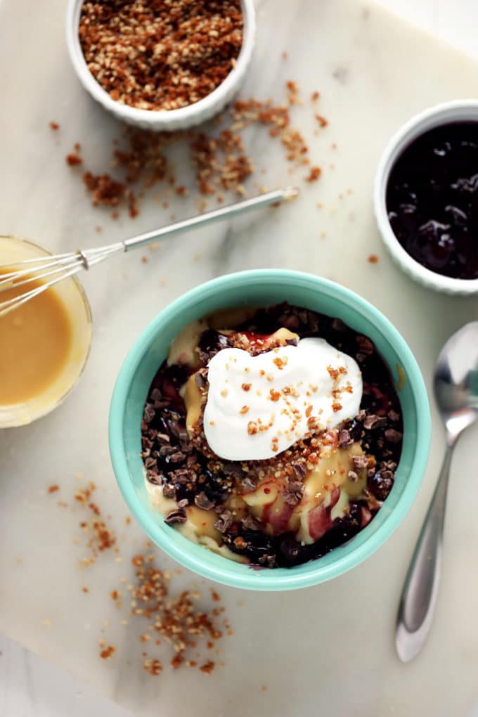 Hot Tahini Sundae with Banana Ice Cream, Cherry Compote & Sunflower Crumble | A decadent vegan sundae!