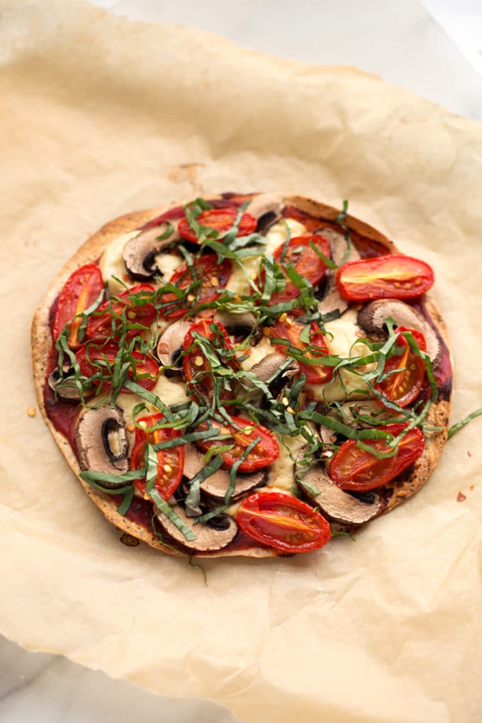 Personal Vegan Tortilla Pizza with Homemade Mozzarella, Mushrooms, Tomatoes, & Basil
