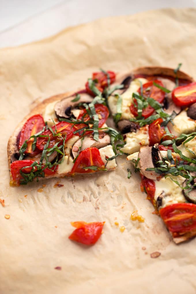 Personal Vegan Tortilla Pizza with Homemade Mozzarella, Mushrooms, Tomatoes, & Basil