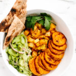 Curried Sweet Potato Power Bowl with Mango-Pear Chutney and Quick Pickled Cucumber Salad