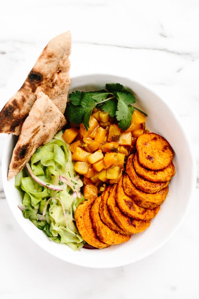 Curried Sweet Potato Power Bowl with Mango-Pear Chutney and Quick Pickled Cucumber Salad
