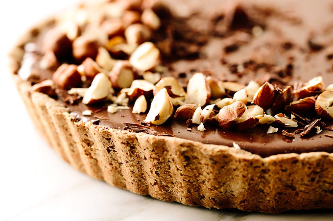 Vegan Triple Chocolate Mousse Tart with Hazelnut Crust