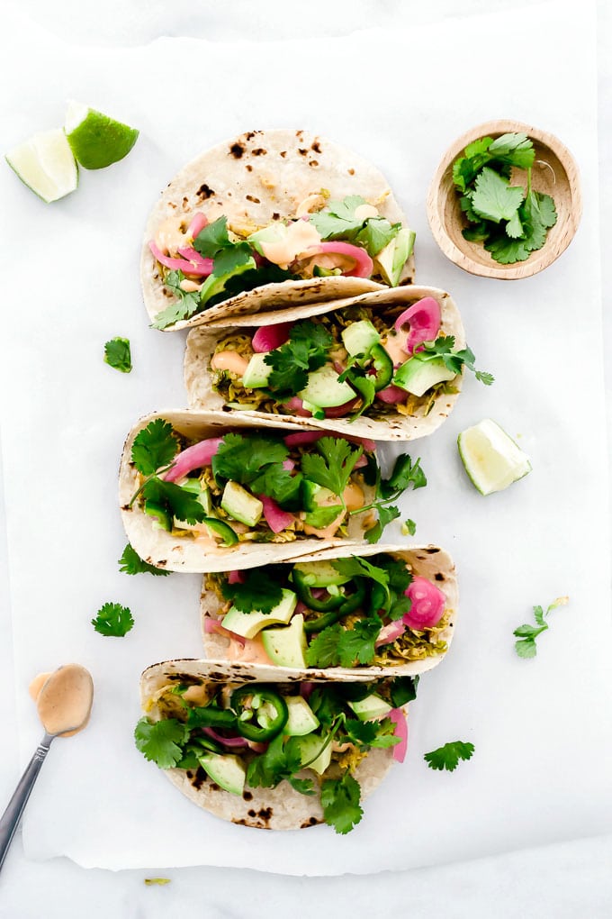 Shredded Vegan Brussels Sprout Tacos Pickled Onions Avocado Sriracha Sauce