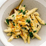 Vegan Tahini Alfredo Pasta with Spicy Pine Nut Parmesan